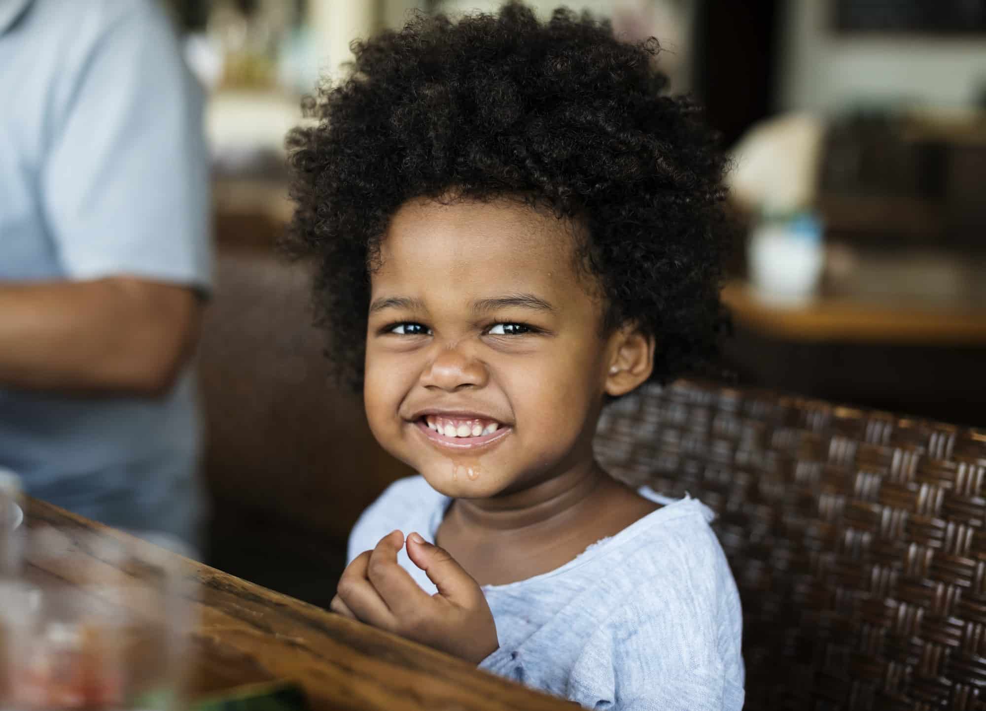 cute-little-african-boy-at-a-resort.jpg